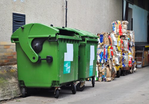 Workers loading a van with shop clearance materials